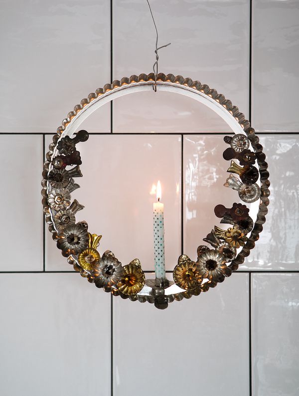 Vintage clip on candle holders made into a DIY wreath.