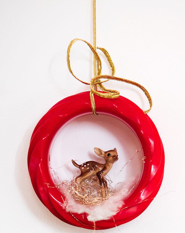 Vintage bangle bracelet with tiny deer figurine made into a DIY holiday mini wreath.