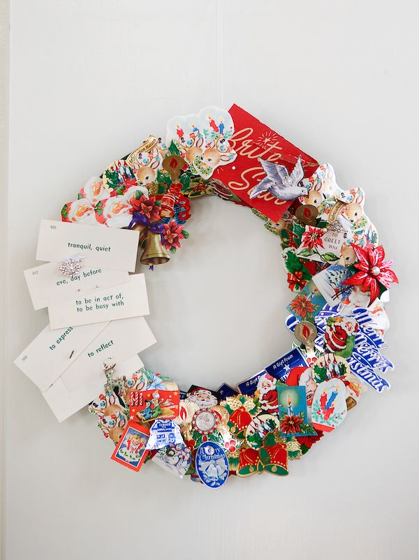 DIY wreath made from vintage holiday ephemera.