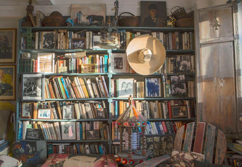 Collection of vintage books on a shelf.