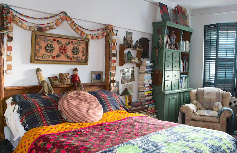 Bedroom with brightly colored vintage furniture and accessories.